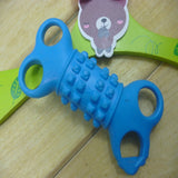 Silicone bone-shaped chewing toy for dogs in blue, featuring a four-hole design.