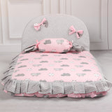 Creative square dog mat in pink and gray with bows and cute animal patterns.