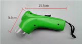 Pet food catapult feeder toy with comfortable grip design, green color, and attached wrist strap.