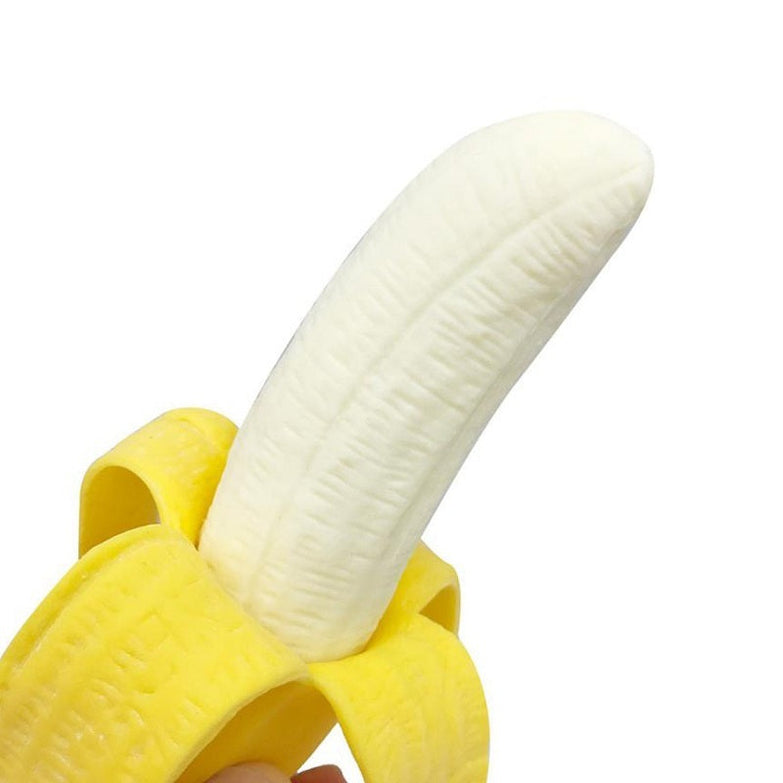 Creative pet TPR banana toy, yellow and white, interactive squeeze prop.