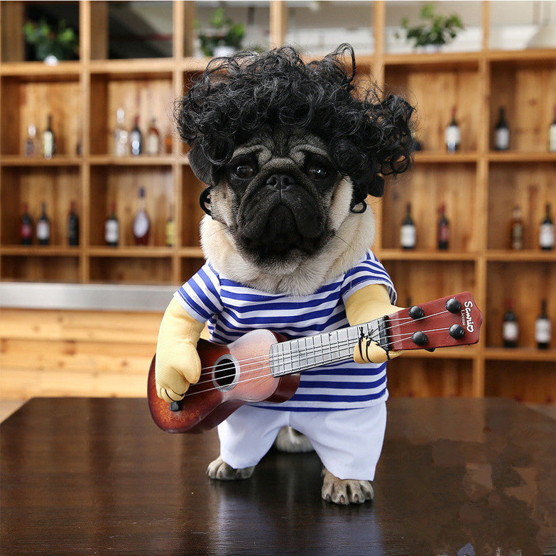 Pet dog dressed as a guitarist in a striped shirt holding a guitar.