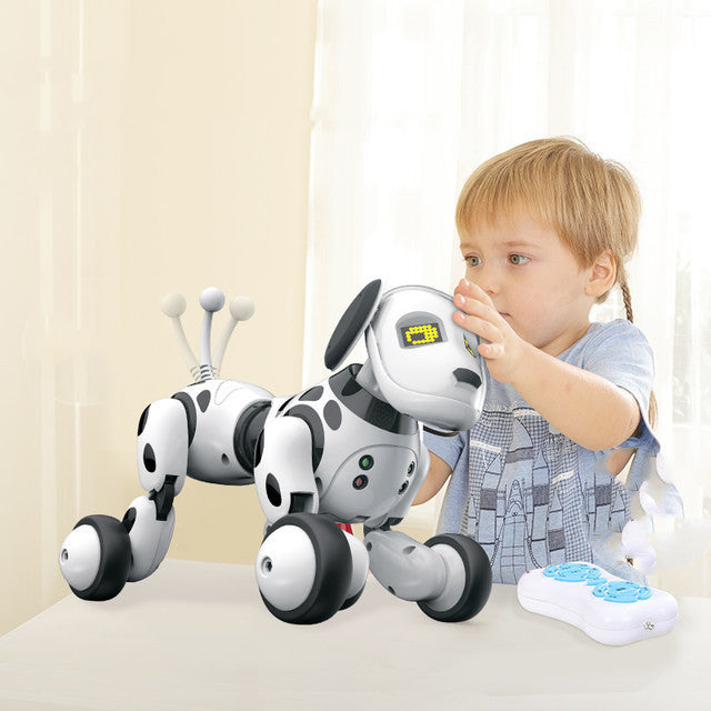 Child playing with electric remote control smart robot dog toy.