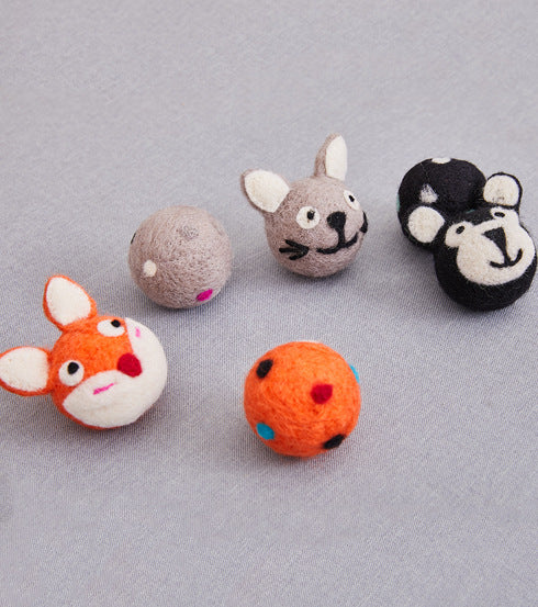 Colorful felt stretch ball cat toy with animal designs and bell sound.