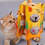 Cat playing with colorful felt stretch ball toy.