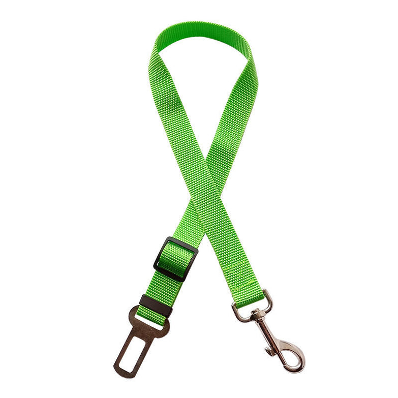 Adjustable pet cat dog car seat belt in green, featuring a nylon strap with metal buckles for vehicle safety.