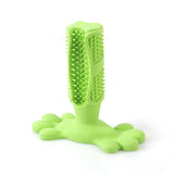 Green rubber dog molar toy for cleaning teeth, with soft bumps for gum protection.