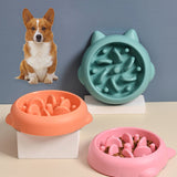 Pet dog cat slow feeder bowls in green, pink, and orange with fun shapes to prevent choking.