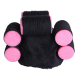 Curly hair pet hat with pink and black plush material, cartoon pattern.