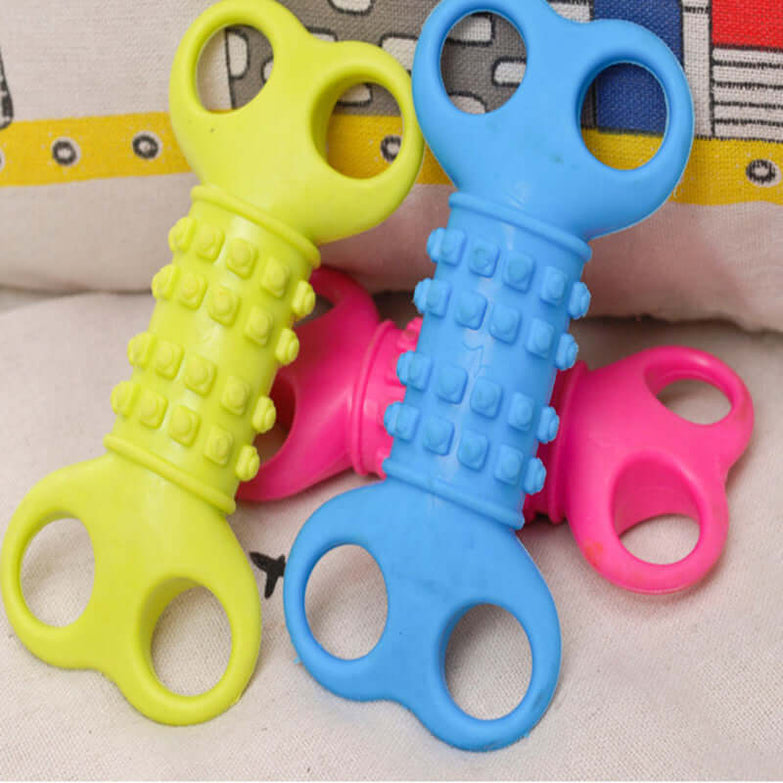 Silicone bone shape chewing toy for dogs in vibrant colors.