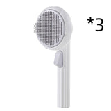 Hand-held steel wire self-cleaning pet brush for cats.