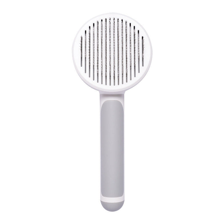 Hand-held steel wire pet brush for hair removal, promotes circulation, reduces hair loss.