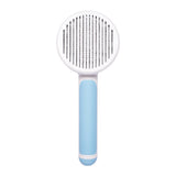 Hand-held steel wire pet cat brush in blue for hair removal and grooming.