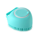 Silicone dog bath massage glove brush for pet grooming and shampoo application.