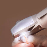 Professional pet nail clipper with LED light trimming a pet's nail.