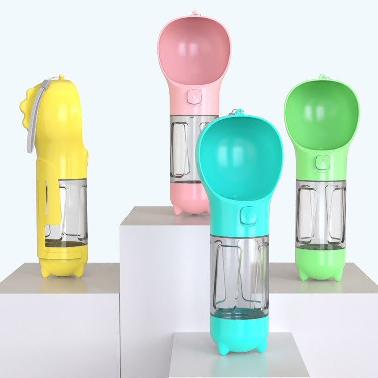 Portable pet water bottles in pink, blue, yellow, and green on display.