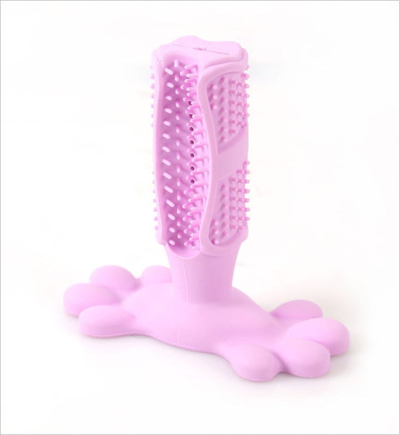 Large pink dog molar toy made of natural rubber with soft bumps for cleaning teeth.