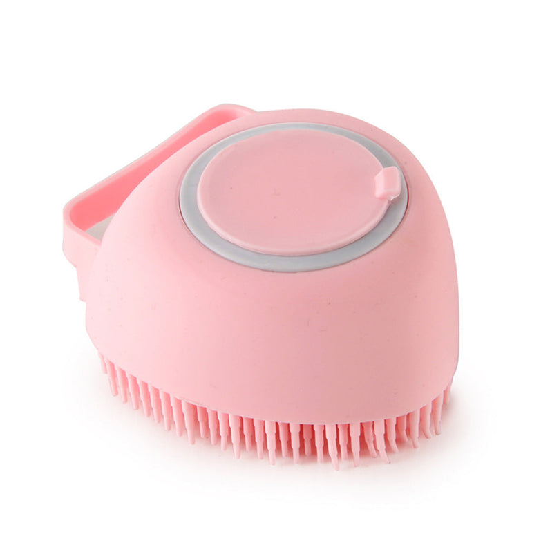 Silicone dog bath massage glove brush for pet grooming and shampoo application.