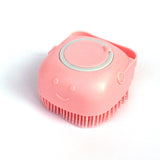 Silicone dog bath massage gloves brush in pink for pet grooming and cleaning.