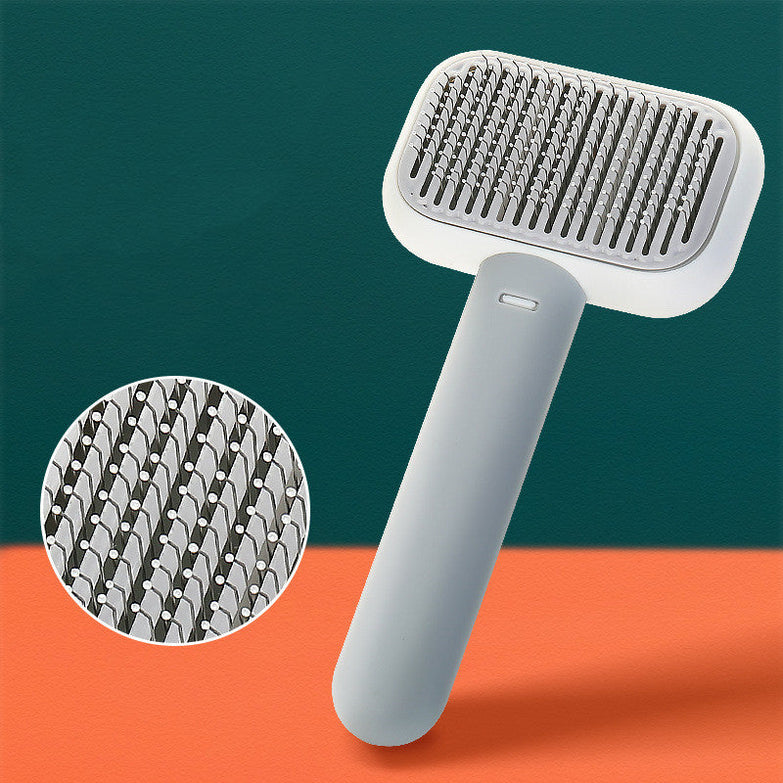 Pet cat dog hair brush in smoke grey, stainless steel bristles, grooming tool.