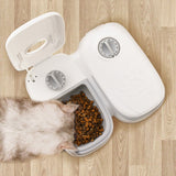 Automatic pet feeder with timer and food dispenser for cats and dogs.