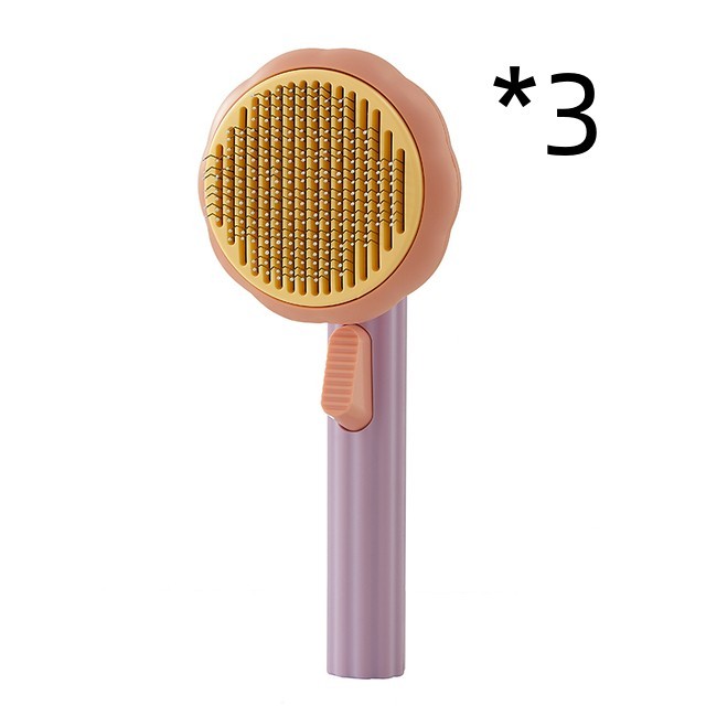 Hand-held pet cat brush with steel wire self-cleaning comb for hair removal.