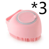 Silicone dog bath massage glove brush in pink for pet grooming.