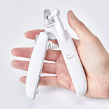 Professional pet nail clipper with LED light for cats and dogs, featuring stainless steel blades and safety baffle.