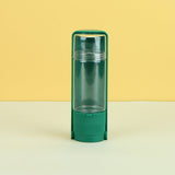 Portable pet water bottle in malachite green for outdoor travel.