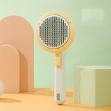 Hand-held steel wire cat brush with self-cleaning comb for hair removal.