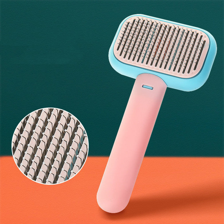 Pet cat dog hair brush with a blue and pink handle, stainless steel bristles; ideal for grooming and preventing knots.